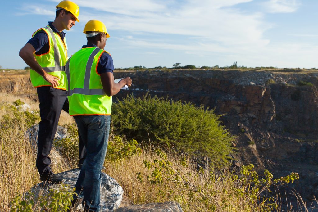surveyors working at mining site