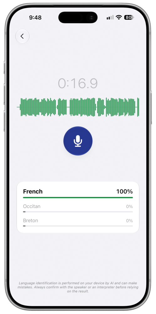 An iPhone running the MyMasterWord app, showing the AI language identification with French as the detected language. A green waveform and blue microphone button appear on the screen.