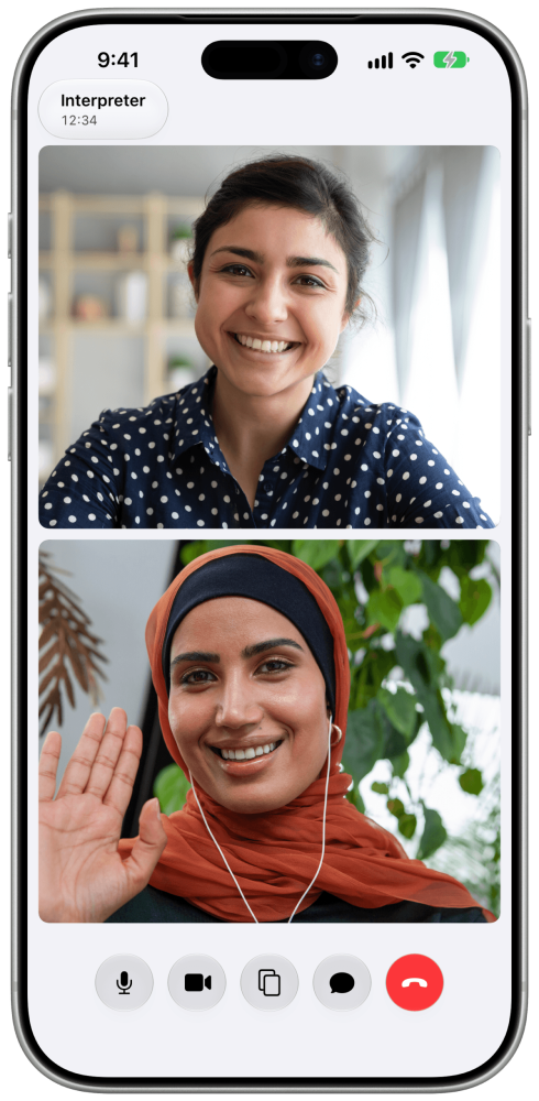 A picture of an iPhone, with the screen showing the MyMasterWord app and a live video call between two women.